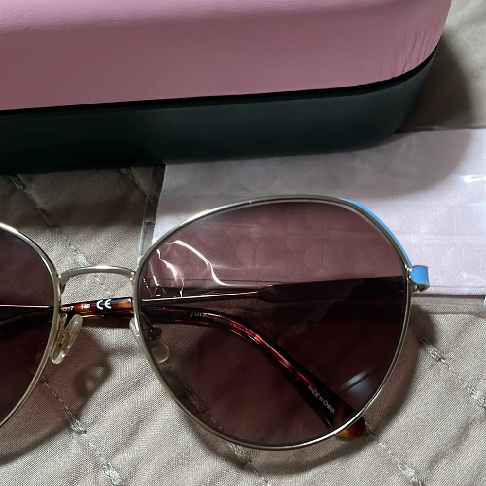 New Kate Spade New York sunglasses.
